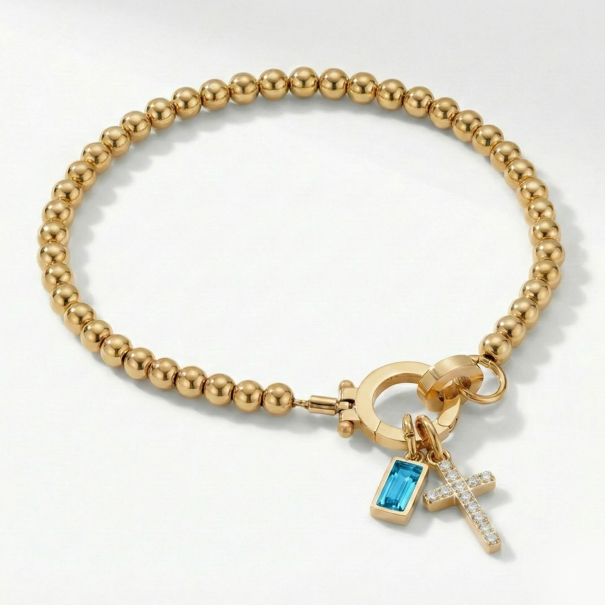 Pulsera AX con cuentas, cruz y piedra natal