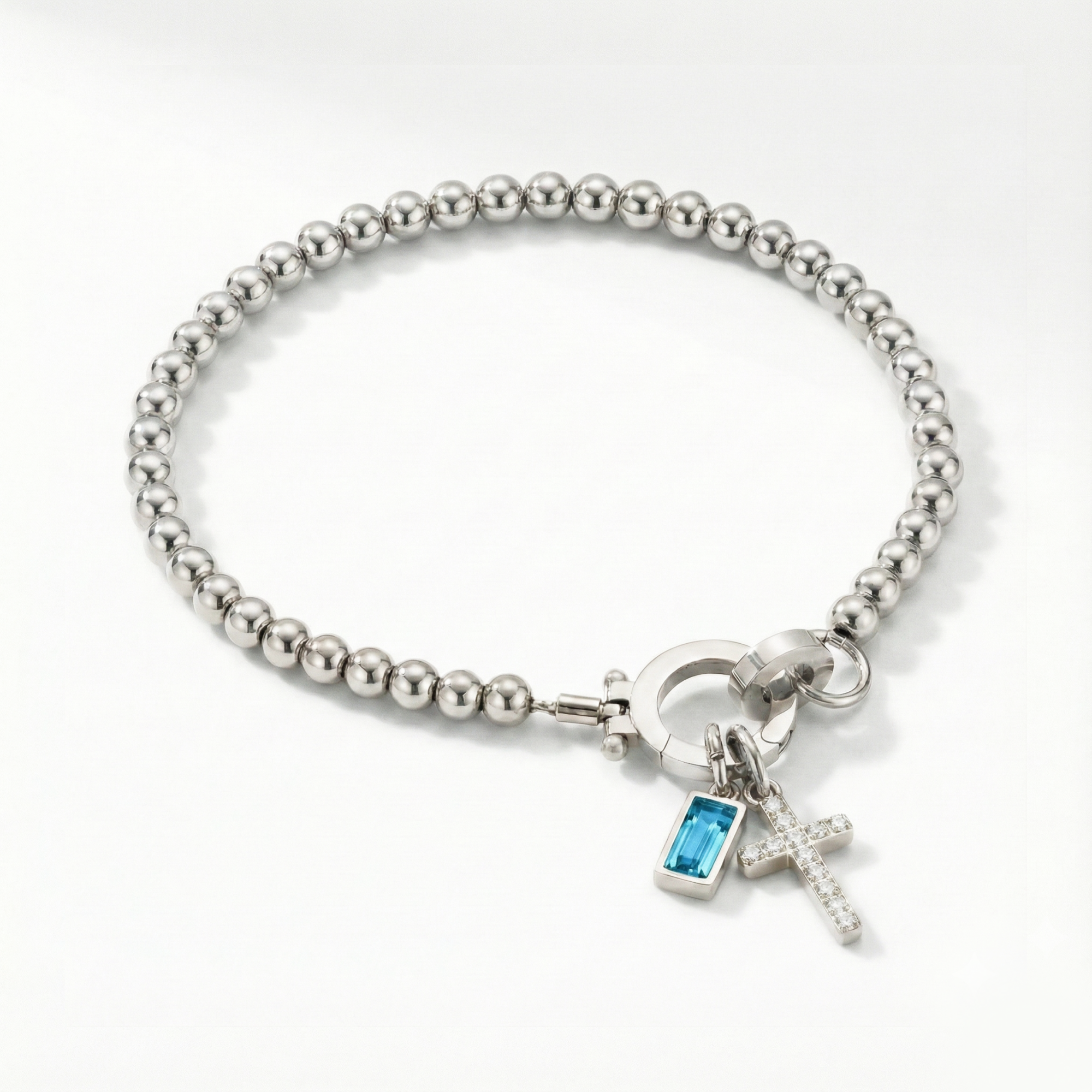 Pulsera AX con cuentas, cruz y piedra natal