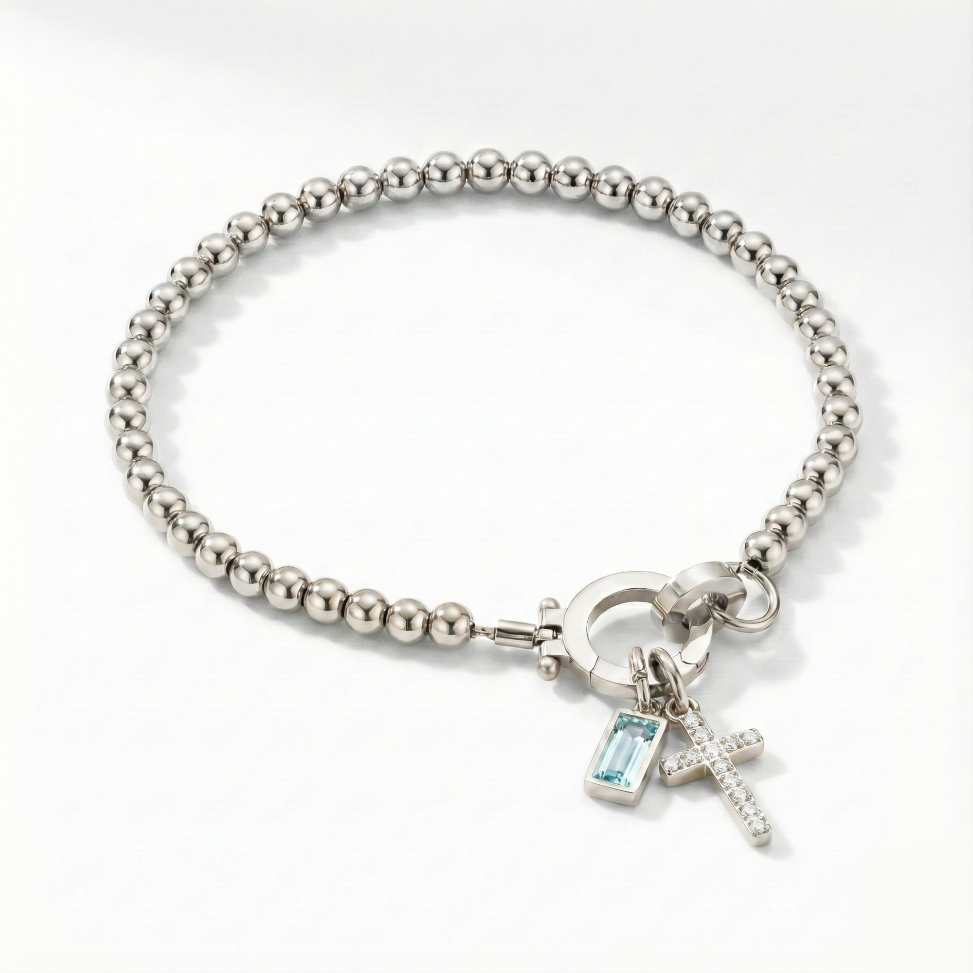 Pulsera AX con cuentas, cruz y piedra natal
